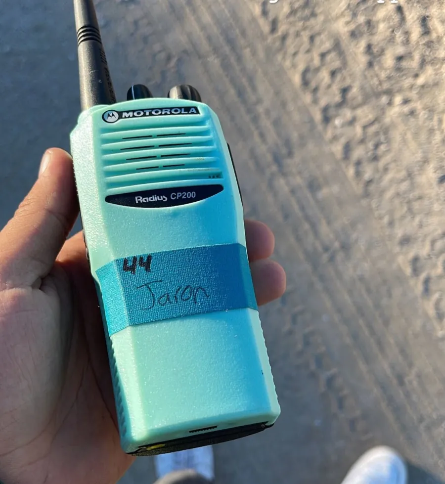 A production walkie with Jaron's name taped on it